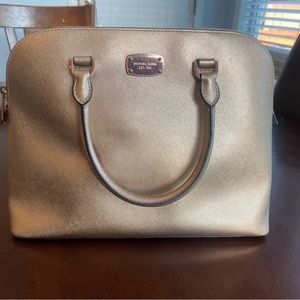 Michael Kors rose gold handbag with rose gold hardware
